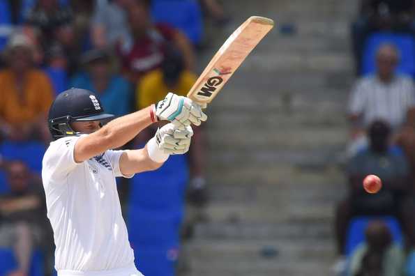 Joe Root (in pic) and Gary Ballance milked the West Indies bowling at a leisurely pace on the fourth morning.