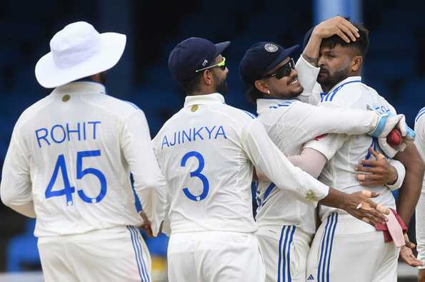 Debutant Mukesh Kumar took his first Test wicket on a tough bowling day for India.