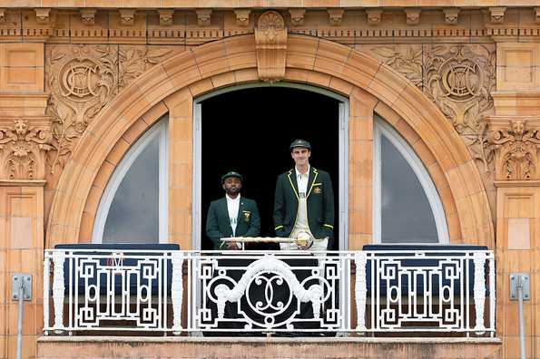 Bavuma and Cummins pose with the mace.